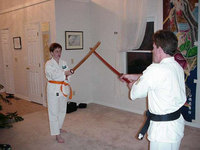 Maryann Cassidy measures off with Chris Torok