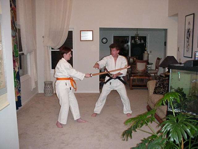 Chris Torok teaches Maryann Cassidy the Bokken