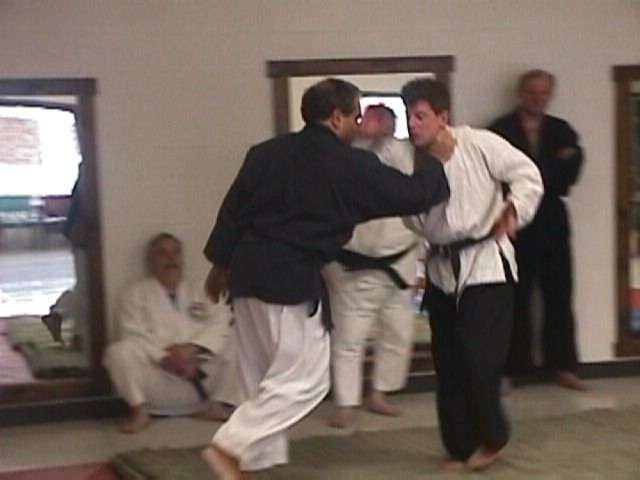 Chris Torok defends against choke from Ron Lanci